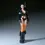 Thumbnail: Anime figure of Nico Robin, standing tall, black outfit, orange stockings, and boots.