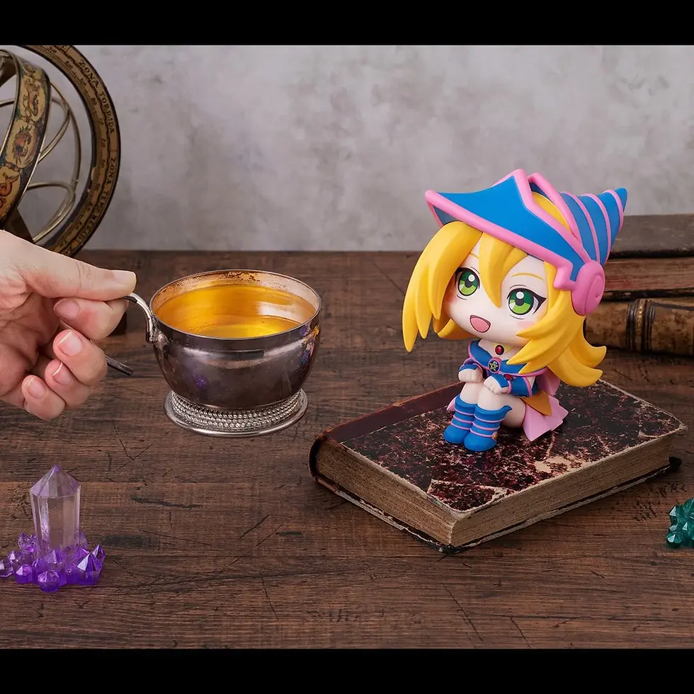 Thumbnail: Hand holding cup near Dark Magician Girl figure on an old book