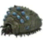Green creature with blue eyes, a detailed and textured figurine.