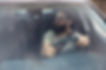 happy-driver-with-safety-belt-fastened-2021-04-02-19-36-06-utc.jpg