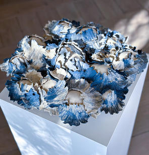 In this series of ceramic sculptures, I focus on exploring the interplay between the balance of order, mathematical precision, and the chaotic beauty of nature.
In my sculptures, I aim to capture this dynamic tension by contrasting geometric shapes and chaotic textures. I exert control over the chaos by guiding the movement of surfaces along the contours of my geometric forms. I prefer to showcase my materials' natural colors. Sometimes I like to use pigmented clay instead of glazing. I like the understated elegance of matte surfaces, as opposed to the more dramatic look of a glossy finish. I only resort to glazing when it is necessary to enhance the visual contrast in my work.