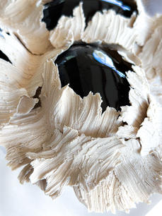 In this series of ceramic sculptures, I focus on exploring the interplay between the balance of order, mathematical precision, and the chaotic beauty of nature.
In my sculptures, I aim to capture this dynamic tension by contrasting geometric shapes and chaotic textures. I exert control over the chaos by guiding the movement of surfaces along the contours of my geometric forms. I prefer to showcase my materials' natural colors. Sometimes I like to use pigmented clay instead of glazing. I like the understated elegance of matte surfaces, as opposed to the more dramatic look of a glossy finish. I only resort to glazing when it is necessary to enhance the visual contrast in my work.