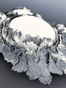 In this series of ceramic sculptures, I focus on exploring the interplay between the balance of order, mathematical precision, and the chaotic beauty of nature.
In my sculptures, I aim to capture this dynamic tension by contrasting geometric shapes and chaotic textures. I exert control over the chaos by guiding the movement of surfaces along the contours of my geometric forms. I prefer to showcase my materials' natural colors. Sometimes I like to use pigmented clay instead of glazing. I like the understated elegance of matte surfaces, as opposed to the more dramatic look of a glossy finish. I only resort to glazing when it is necessary to enhance the visual contrast in my work.