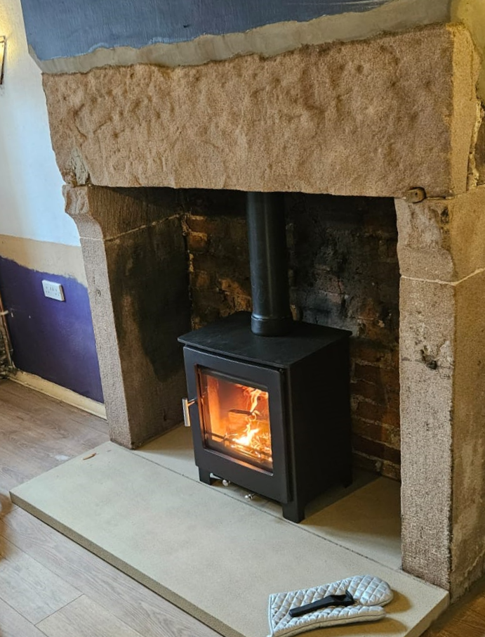 Discovering a Gritstone Fireplace