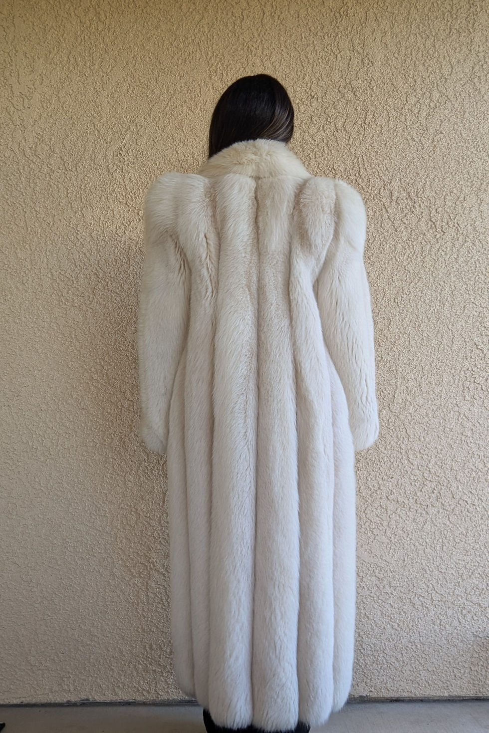 섬네일: Back view of vintage Revillon fox fur coat highlighting vertical panel construction and original shape