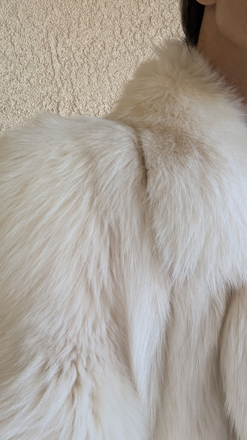 섬네일: Close up of structured shoulder on vintage Revillon fox fur coat showing clean tailoring and craftsmanship