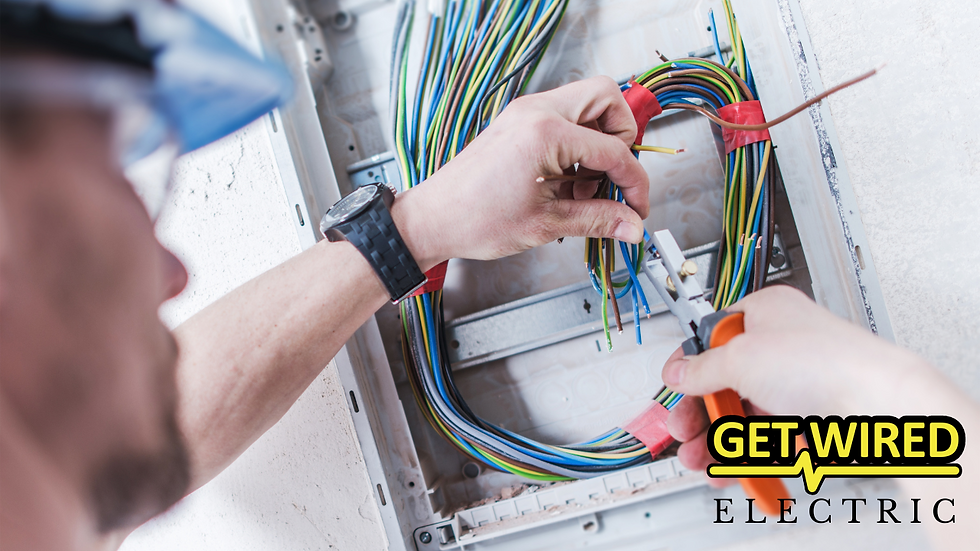 Get Wired Electric LLC's expert electrician meticulously installing electrical wiring.