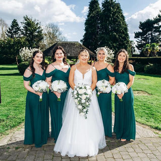 Bridal party outdoors in Surrey countryside