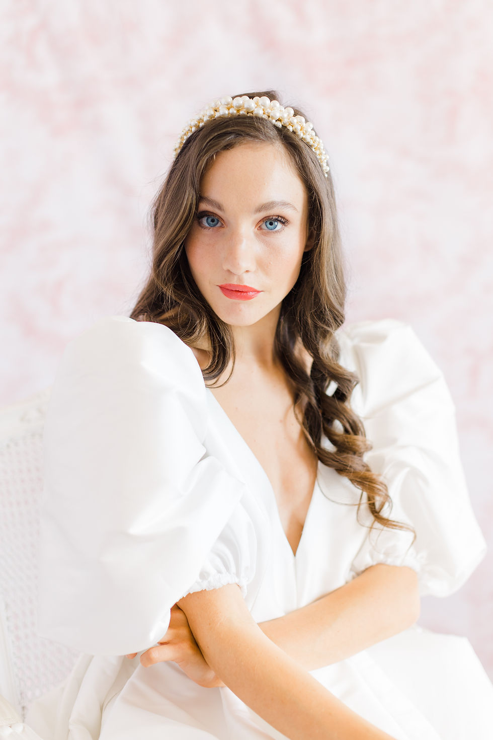 Soft wavy hairstyle with an adorned headband on a London bride looking stylish and modern.