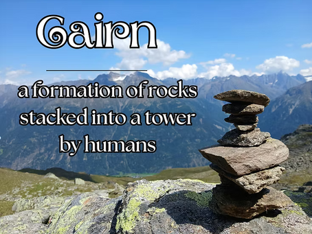 rock stack on mountain and cairn definition