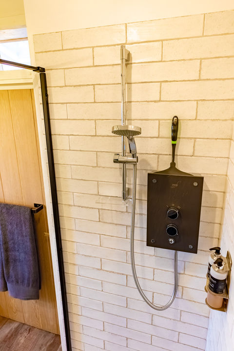 the shower unit and the bathroom door