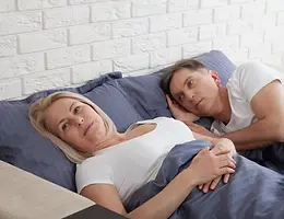 unhappy-middle-aged-couple-in-bedroom-at-home-1163798661_1258x838.jpeg.webp