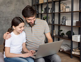 dad-teaching-girl-use-laptop.jpg