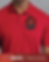 Close up of the Deep Red polo showing appliqué and shirt texture