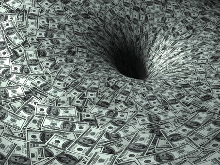 Throwing Money In Holes