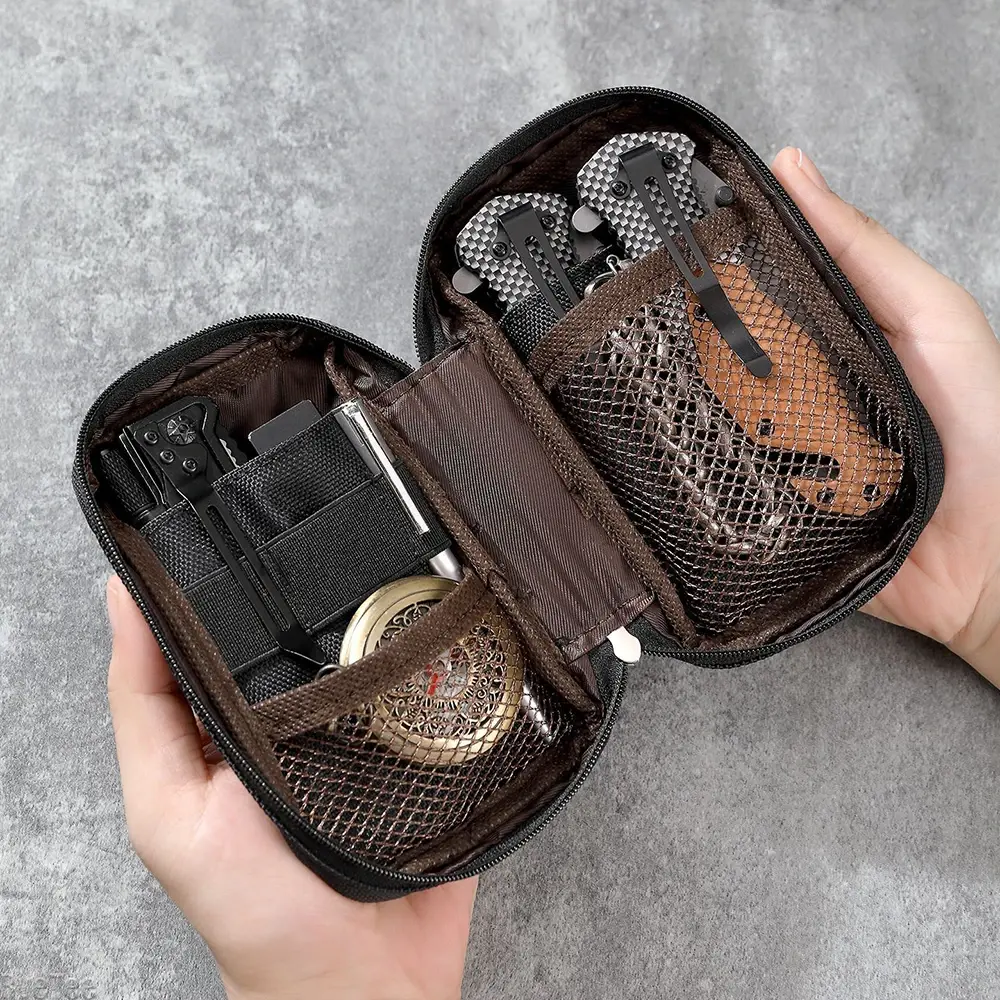 Outdoor EDC organizer pouch with multitools and pocket gear.