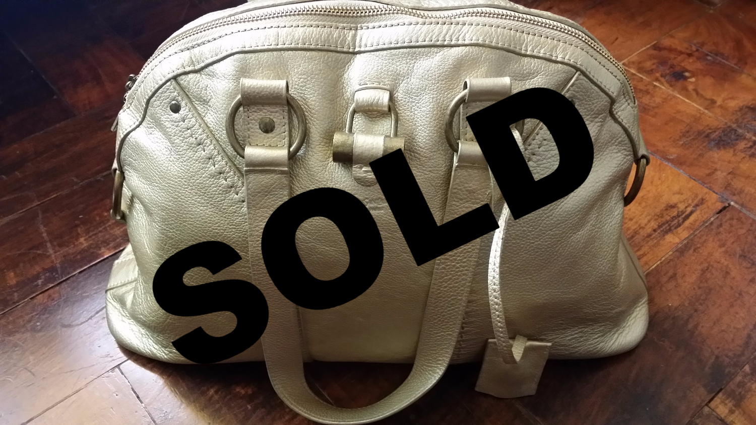 Preloved Authentic Gold YSL Muse