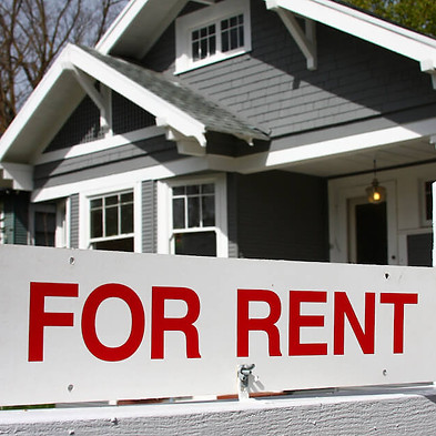 for-rent-sign-in-front-of-gray-house.jpg