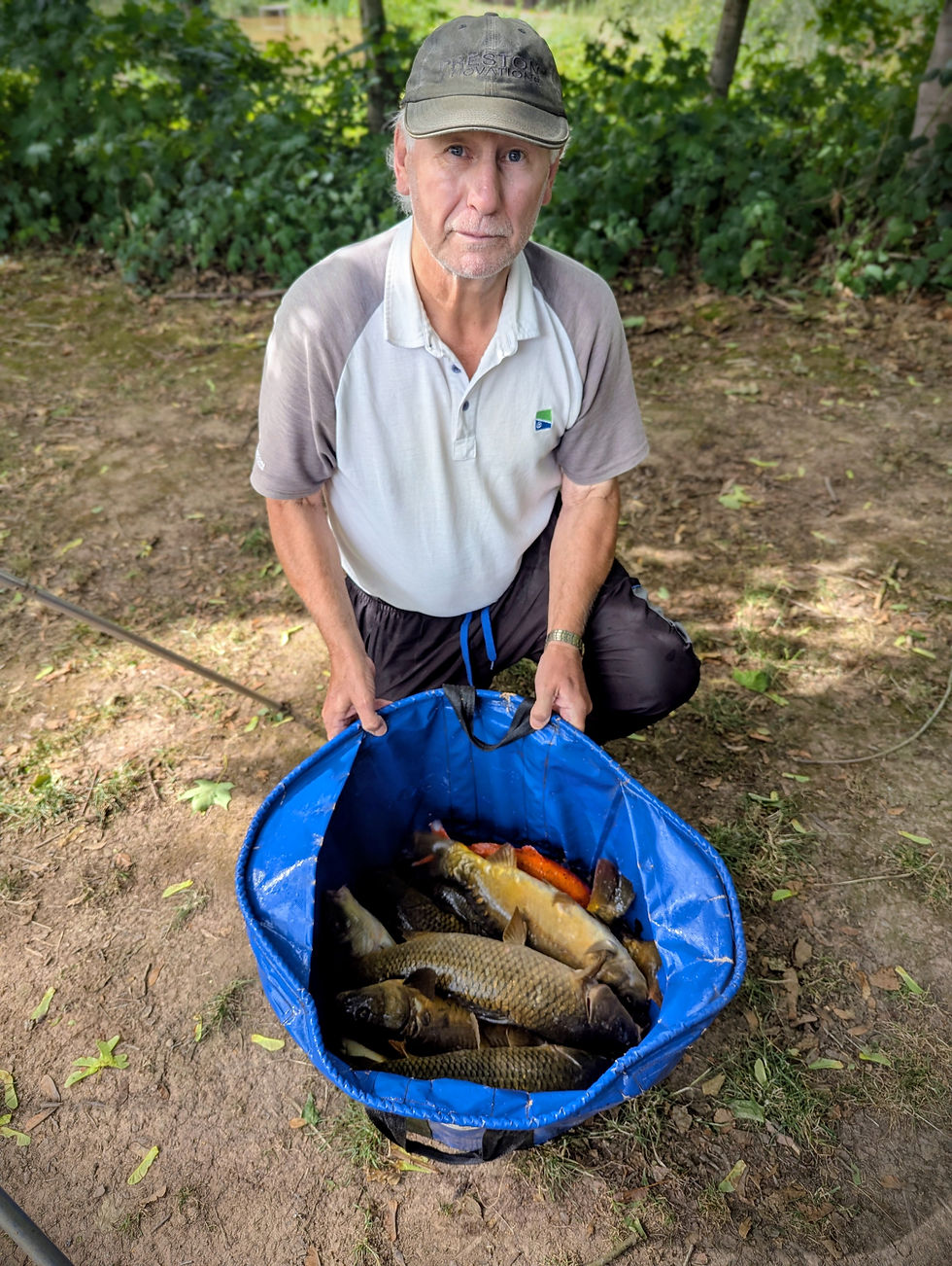 Dave Bowyer with one of his five nets that saw the previous match weight record on Island pool tumble