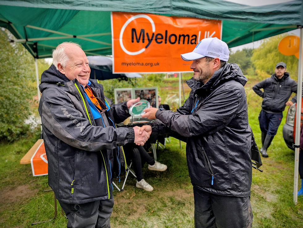 Scott Banks receives the Wendy Latham Memorial shield from event founder, John Latham