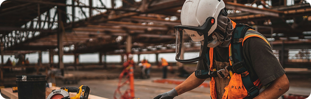 Construction site with workers and equipment