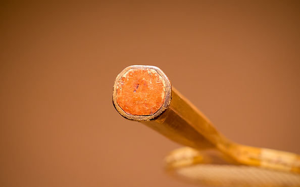 Slazenger Pastime lawn tennis racquet butt end, manufactured in 1905, wooden handle with original grip detail.