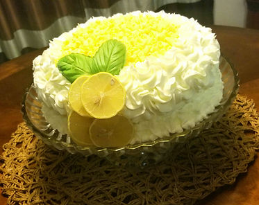 White Cake with Lemon Icing and White Chocolate Curls.jpg