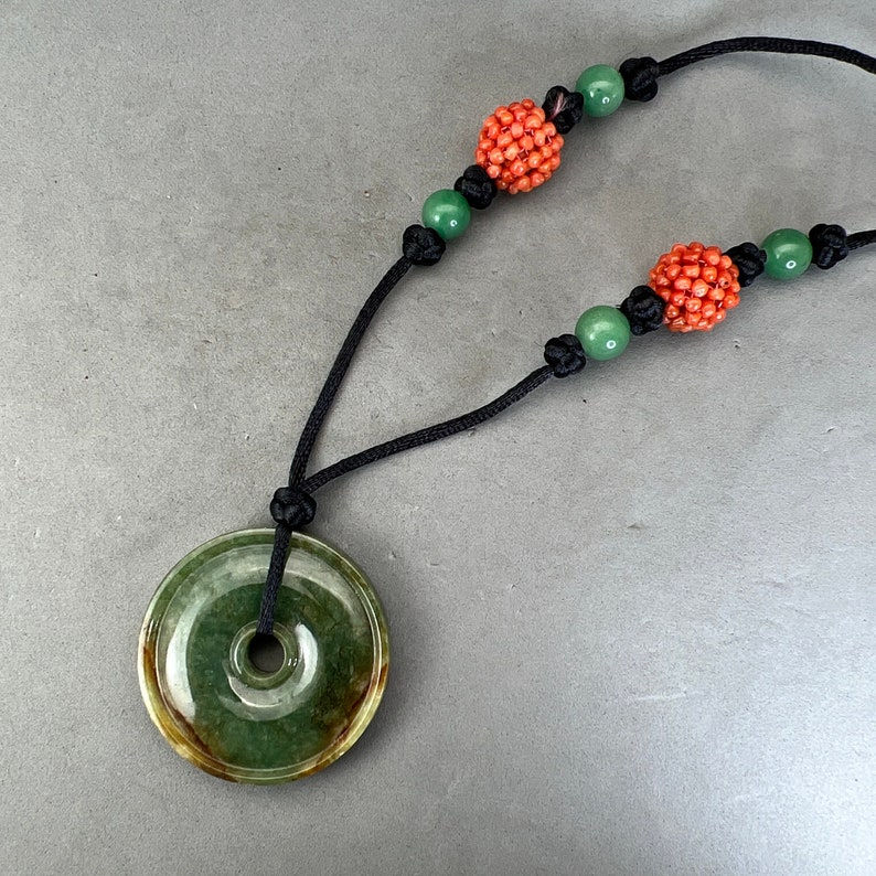 Jadeite pendant of donut, natural color Burmese jade, green and brown