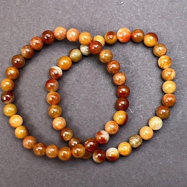 Jade bracelet: One natural color jadeite bead bracelet yellow jade, 7mm