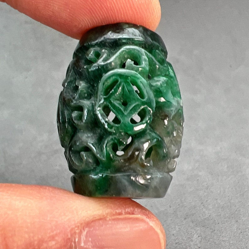 Jade carving: One(1) hand carved natural color jade tube bead, carved with