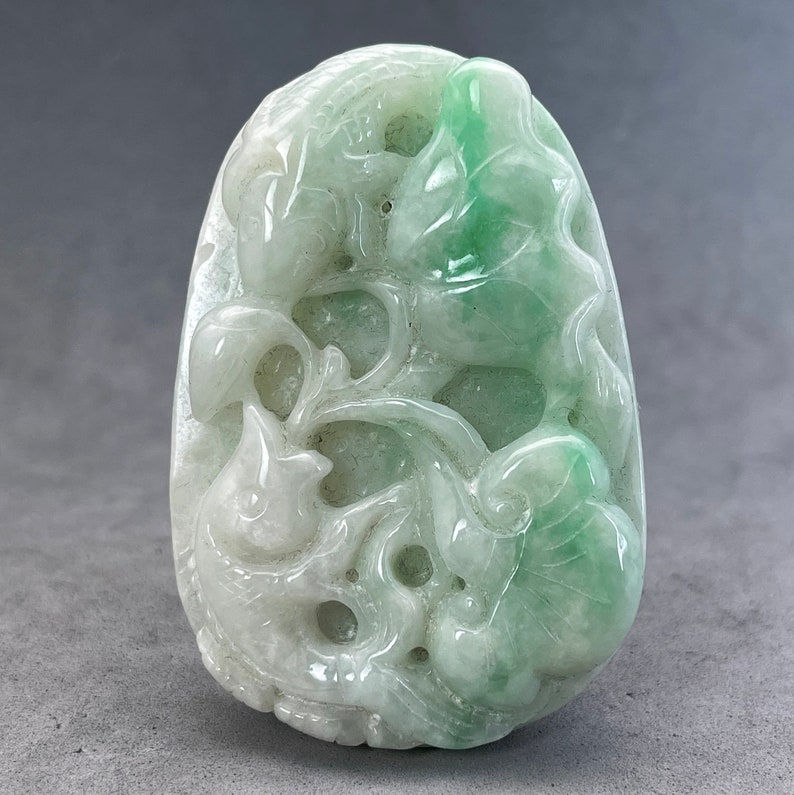 Vintage Hand carved Jadeite pendant of fish and lotus pad, prosperity and