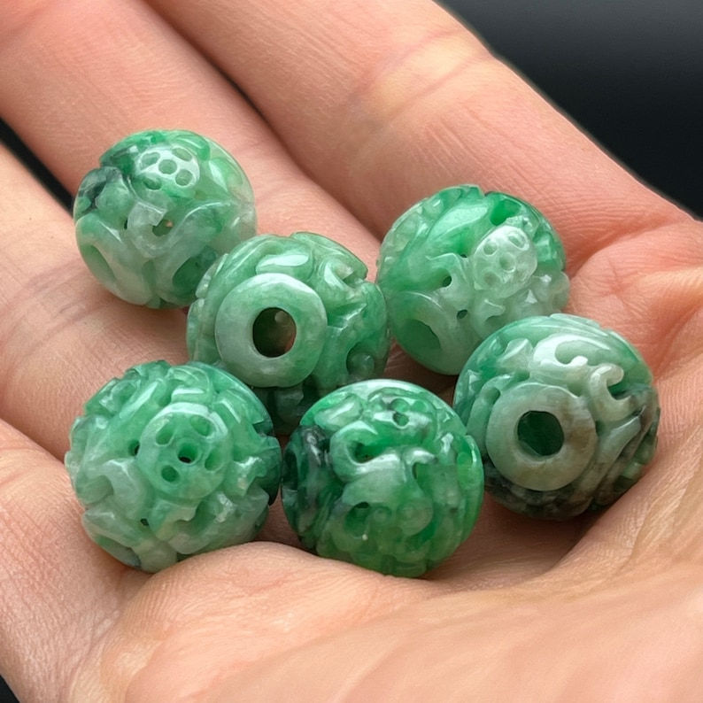 Jade carving: one hand carved natural color jadeite bead, carved with