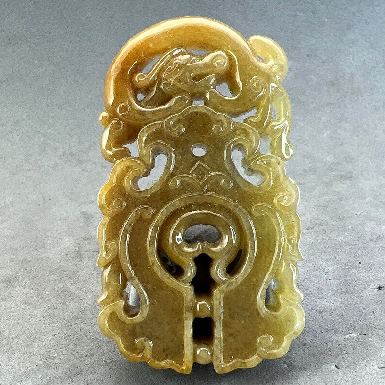 Vintage Hand carved Jadeite pendant of dragon, year of the dragon, golden