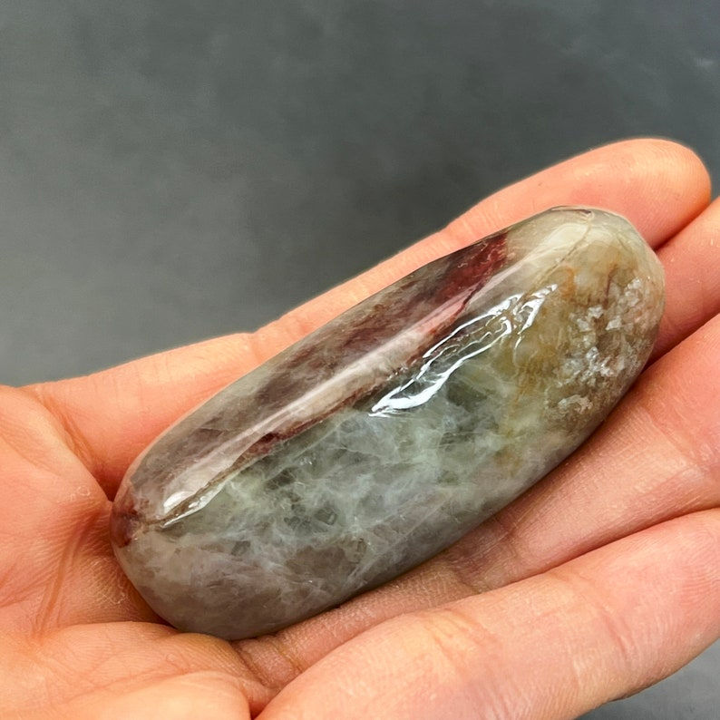 Jadeite specimen: jadeite boulder, rough cut, jadeite specimen, polished