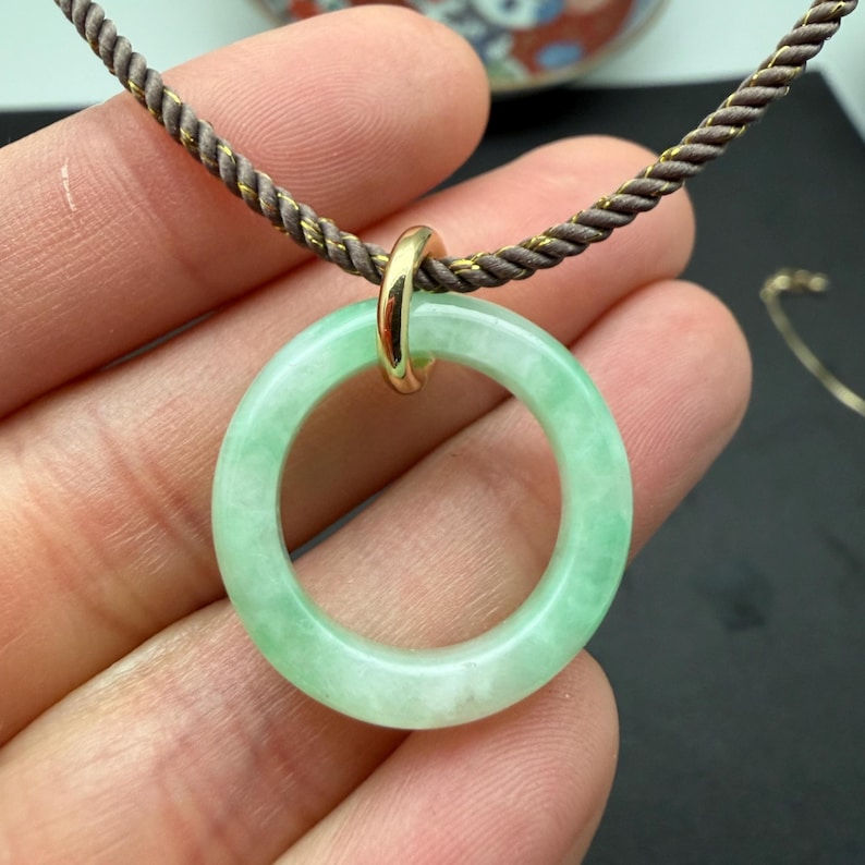 One translucent Icy green jadeite donut, Pi, necklace, pi is a symbol of