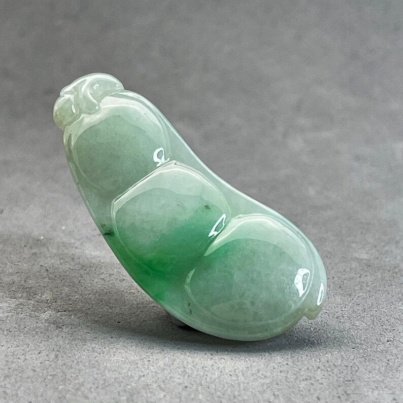 Hand carved and polished Jadeite bead: vintage fei cui of a pea pod, symbol