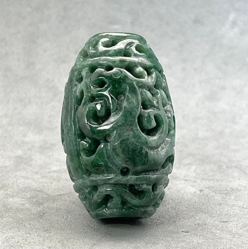 One jadeite bead: hand carved natural color jade tube bead, carved with