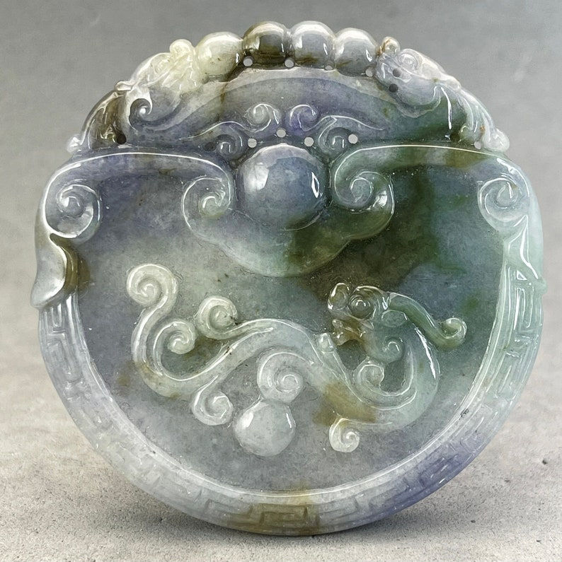 Hand carved Jadeite pendant of dragon, year of the dragon, prosperity and