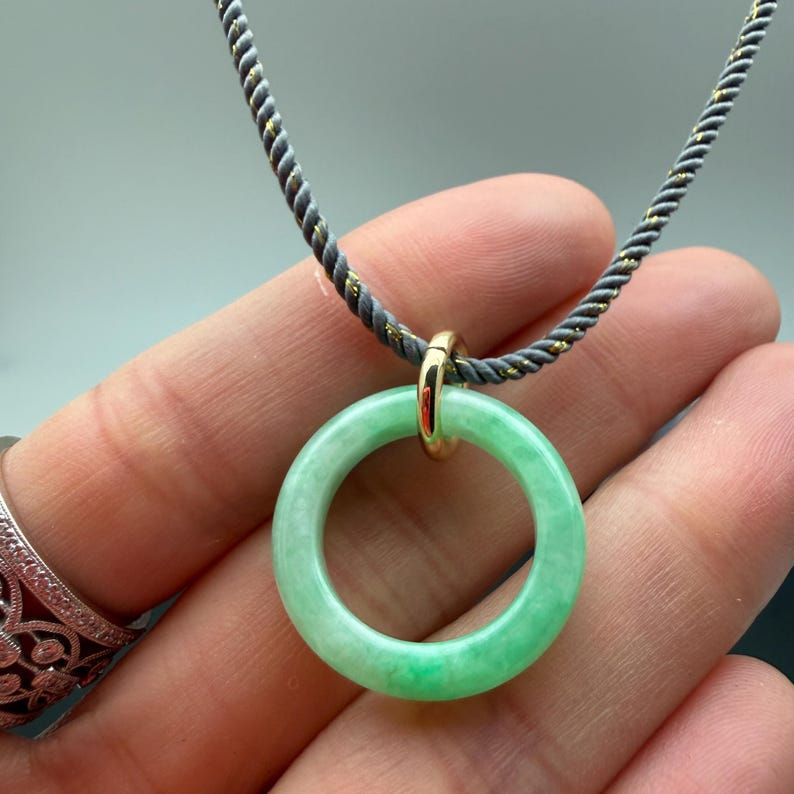 One translucent Icy green jadeite donut, Pi, necklace, pi is a symbol of