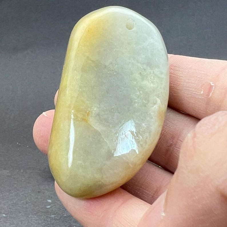 Jadeite specimen: jadeite boulder, rough cut, jadeite specimen, polished