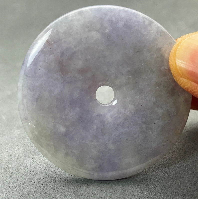 One hand polished natural color jadeite donut, lavender jade donut