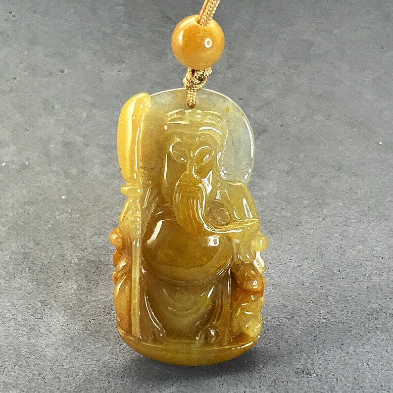 Jade carving: Burmese jade pendant of Lord of war, Kwan yu, symbol of