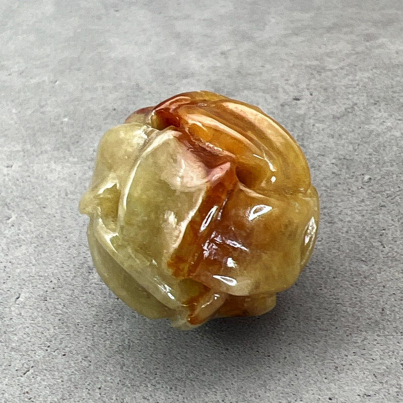 Jade carving: One hand carved yellow jadeite bead, eternity knot bead