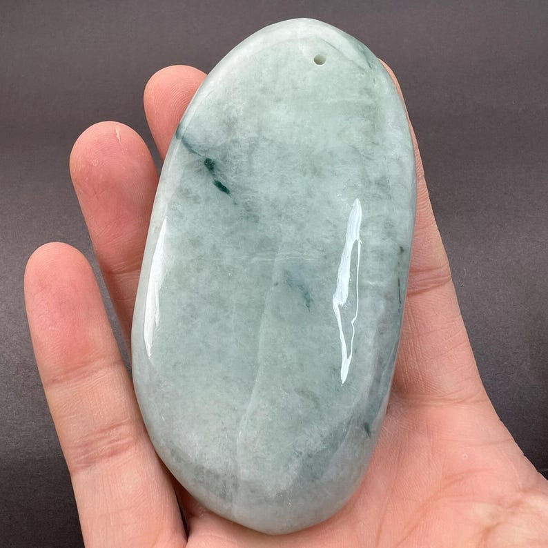 Jadeite specimen: jadeite boulder, rough cut, jadeite specimen, polished