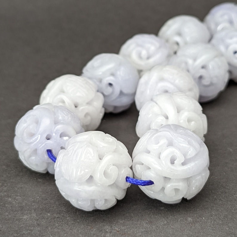Jade carving: one(1) bead, hand carved natural color jadeite bead, carved