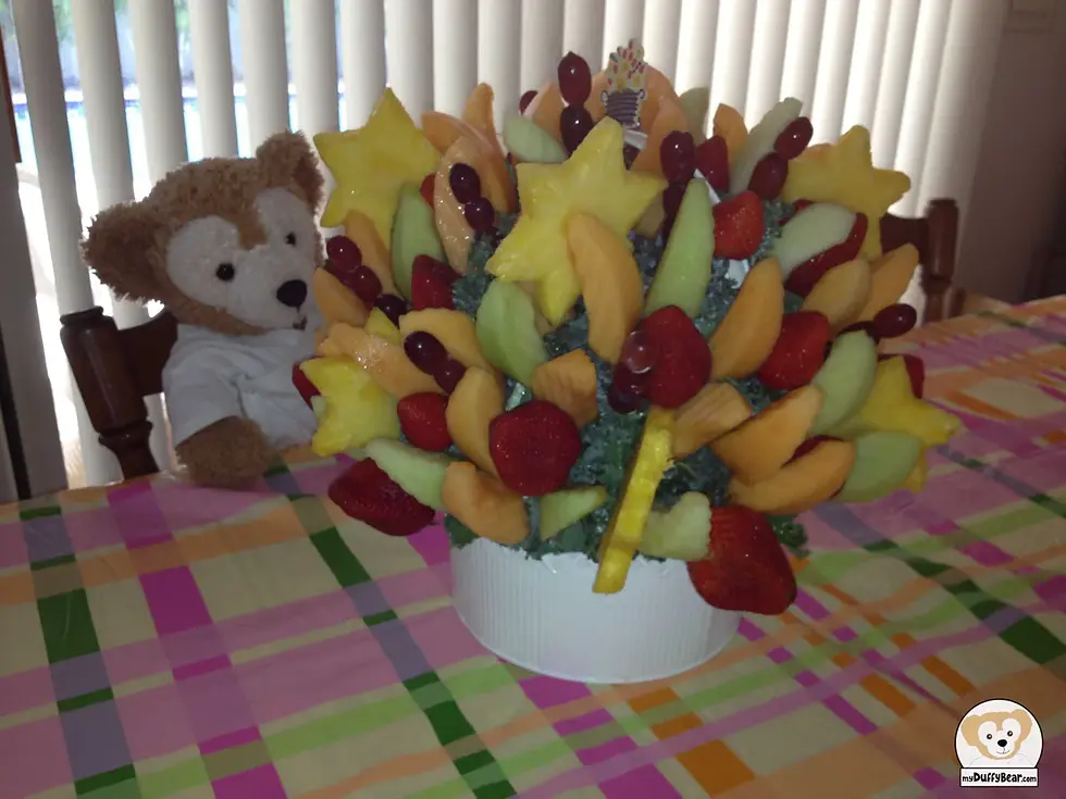 Duffy the Disney Bear with large Edible Arrangements gift