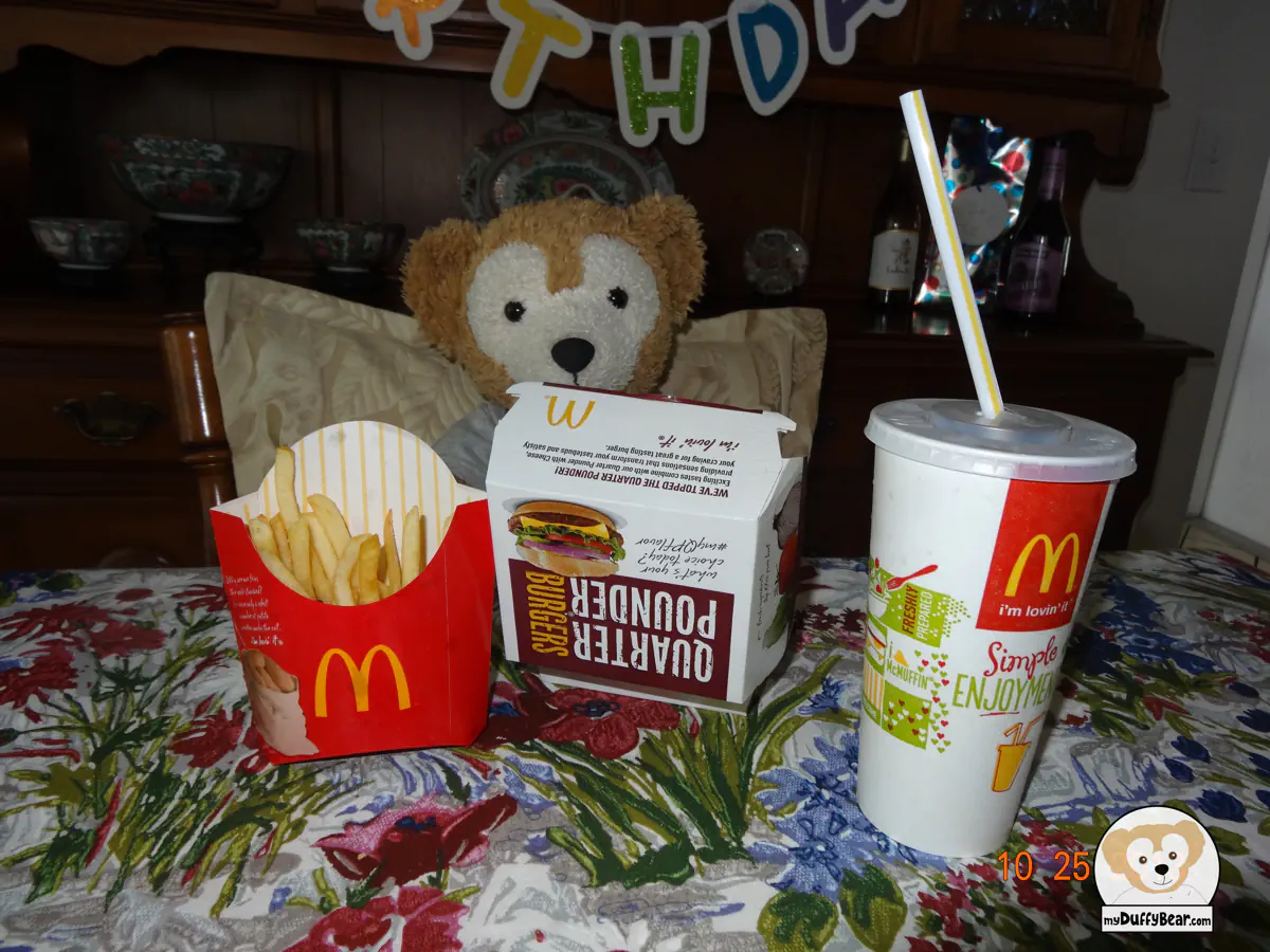 Duffy's fries, quarter pounder and drink are on the table