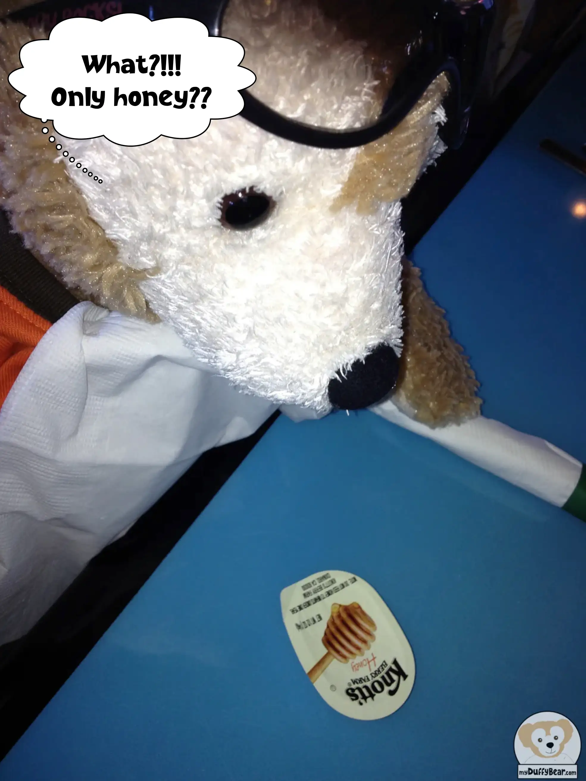 Duffy is wondering why he only has a little packet of honey in front of him