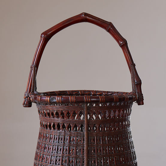 Fine Chinese-inspired bamboo flower basket by Tanabe Chikuunsai II