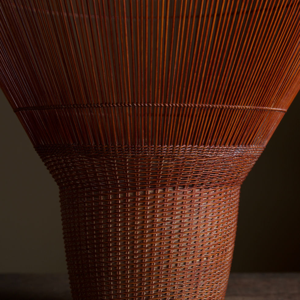 Intricate basketry art by Tanabe Chikuunsai II, featuring mat-plaiting and 'thousand line' construction, reflecting classical and modern influences.